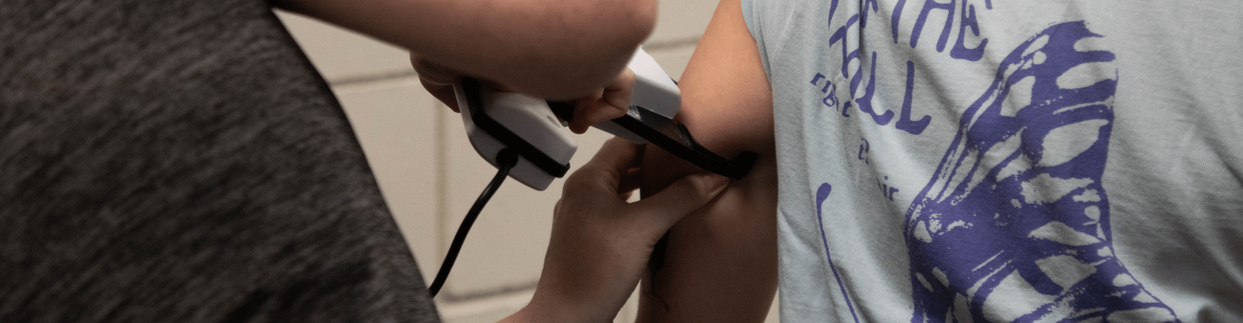 Personal Trainer conducting Skin fold assessment