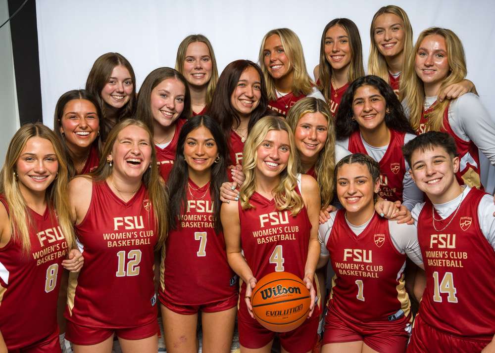 WomensClubBasketballTeam Women's Club basketball team smiling together