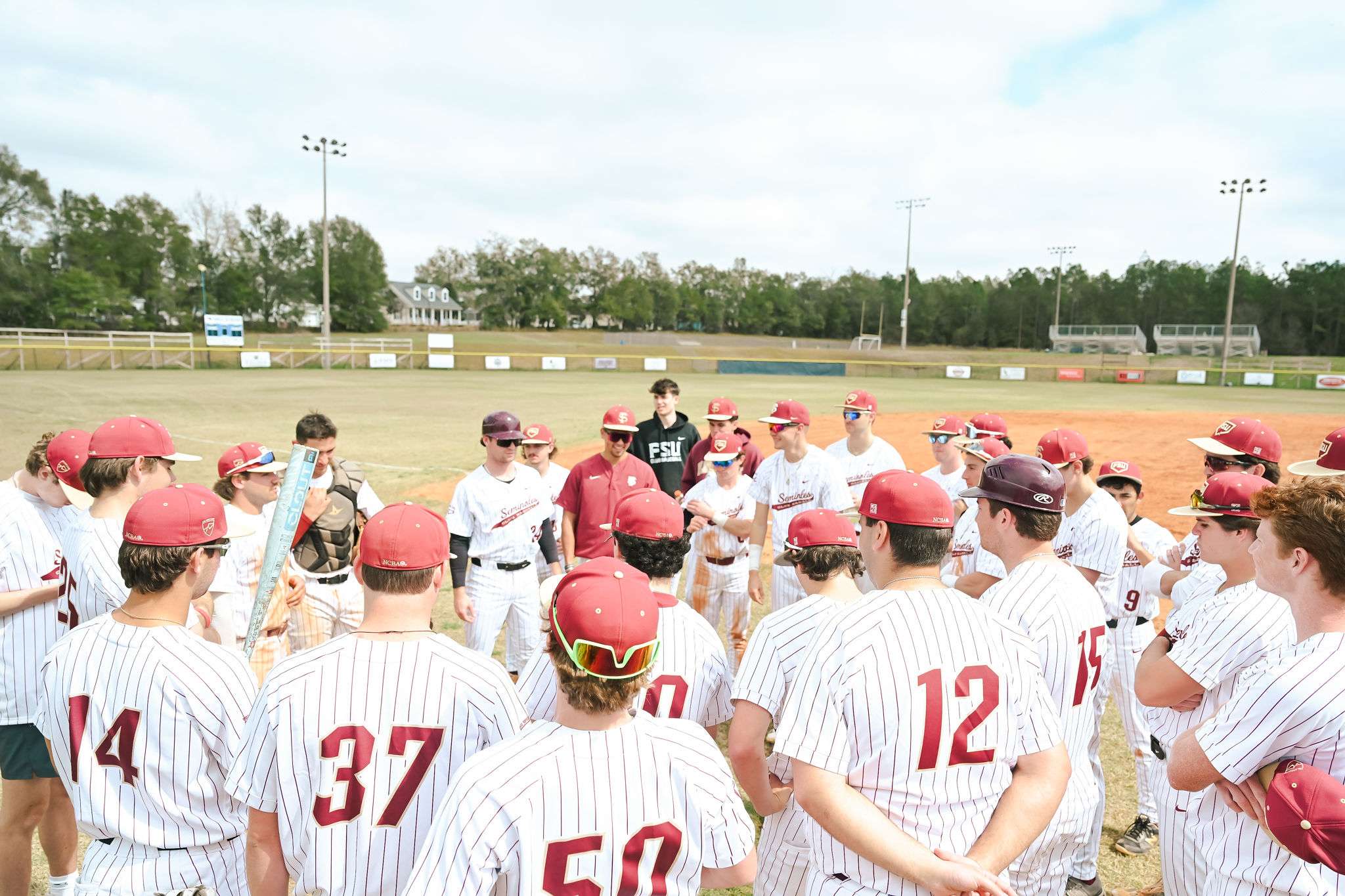 BaseballClubTeamHuddle FSU Club Baseball team huddles up before a game